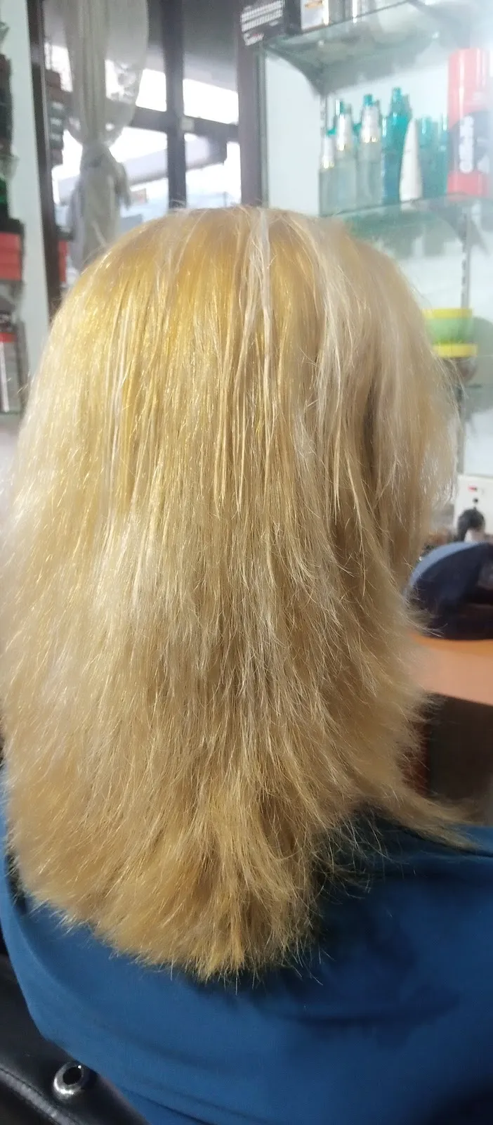 Soft, smooth long hair after a wash and blow-dry at Dragon Hair Salon